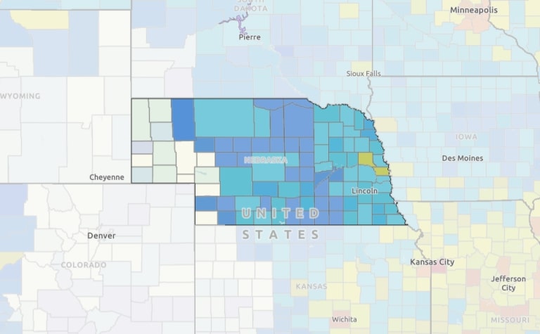 A map of Nebraska with counties color-coded according to heat wave risk, as well as social vulnerability index.